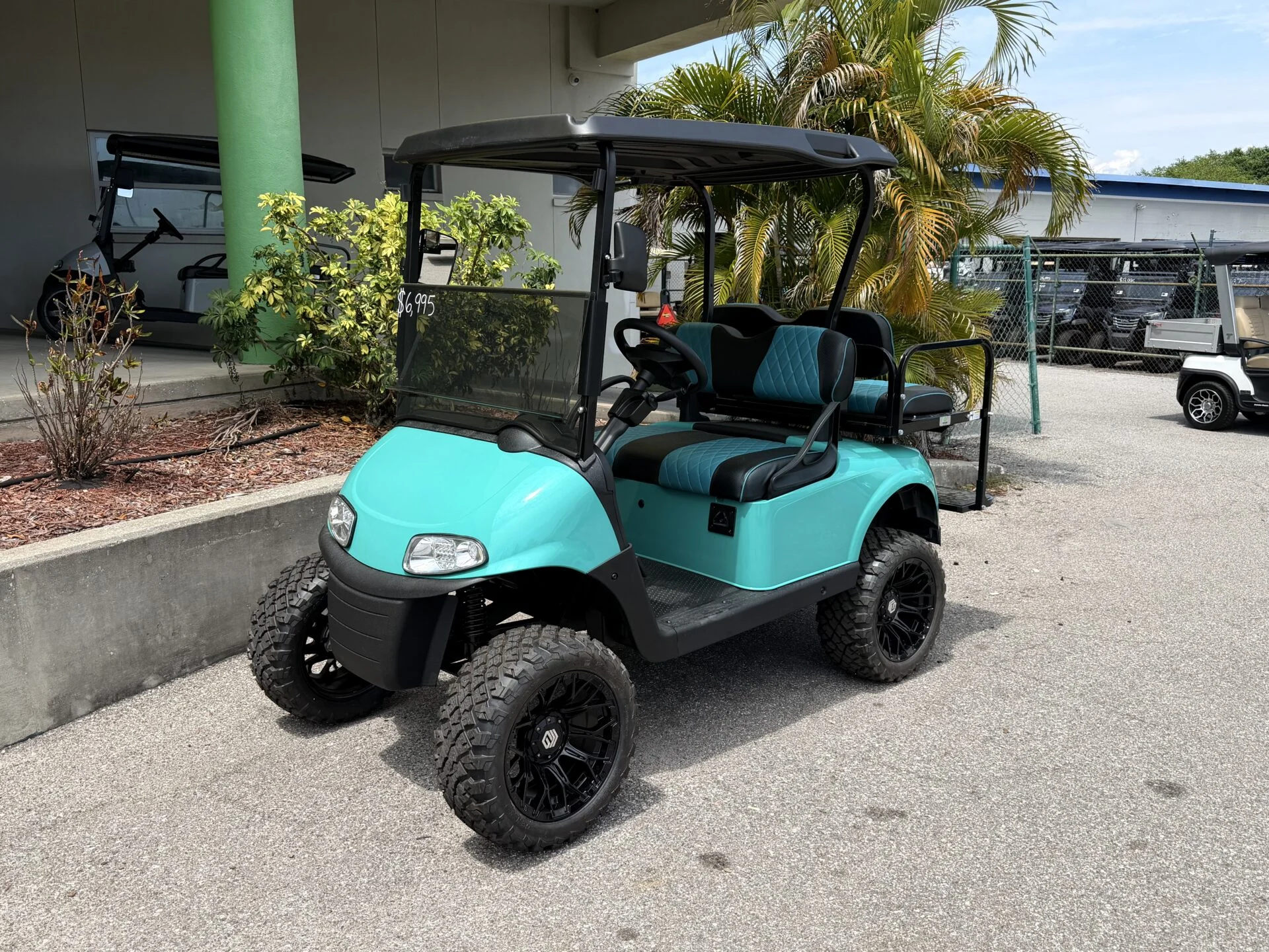 2020 E Z GO RXV Elite Lithium Lifted Golf Cart for Sale (Turquoise) (1)